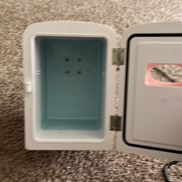 a skincare/ mini fridge, i do need to clean it a little, but it’s so cute! - Picture 4 of 4